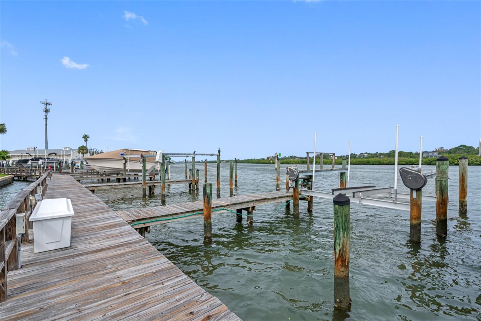 .. ALL NEW DOCKS AND WALKWAY BEING INSTALLED RIGHT NOW IN 2025.. Deeded Boat Slip # 11 Capable of Handling Large 45' Plus Craft.. No Extra Monthly Fees for Dock Privileges. Will Update NEW DOCK Photos.