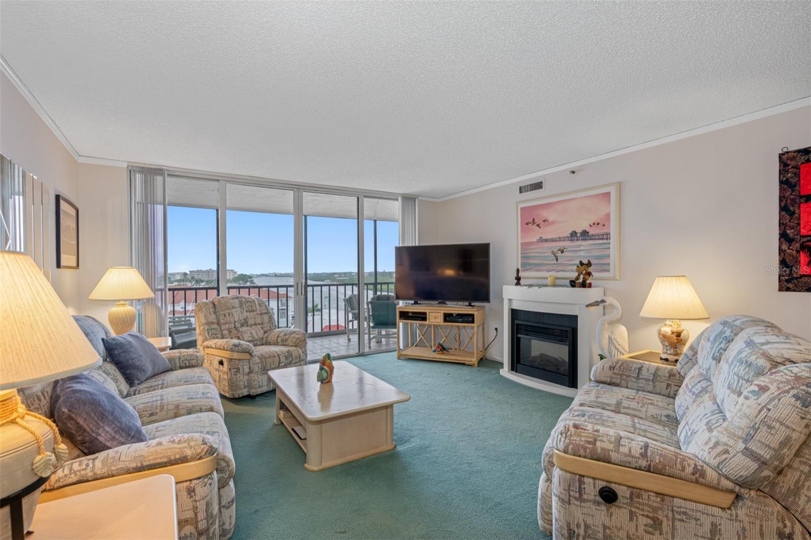 . PH Top Floor Unit # 611 Enjoys Privacy & Long Range Water Views for Miles. Large 2 Bedroom 2 Bath  With Spacious 28 X 15 Great Room.  New Impact Sliders + New Storm Shutters + New Flooring.