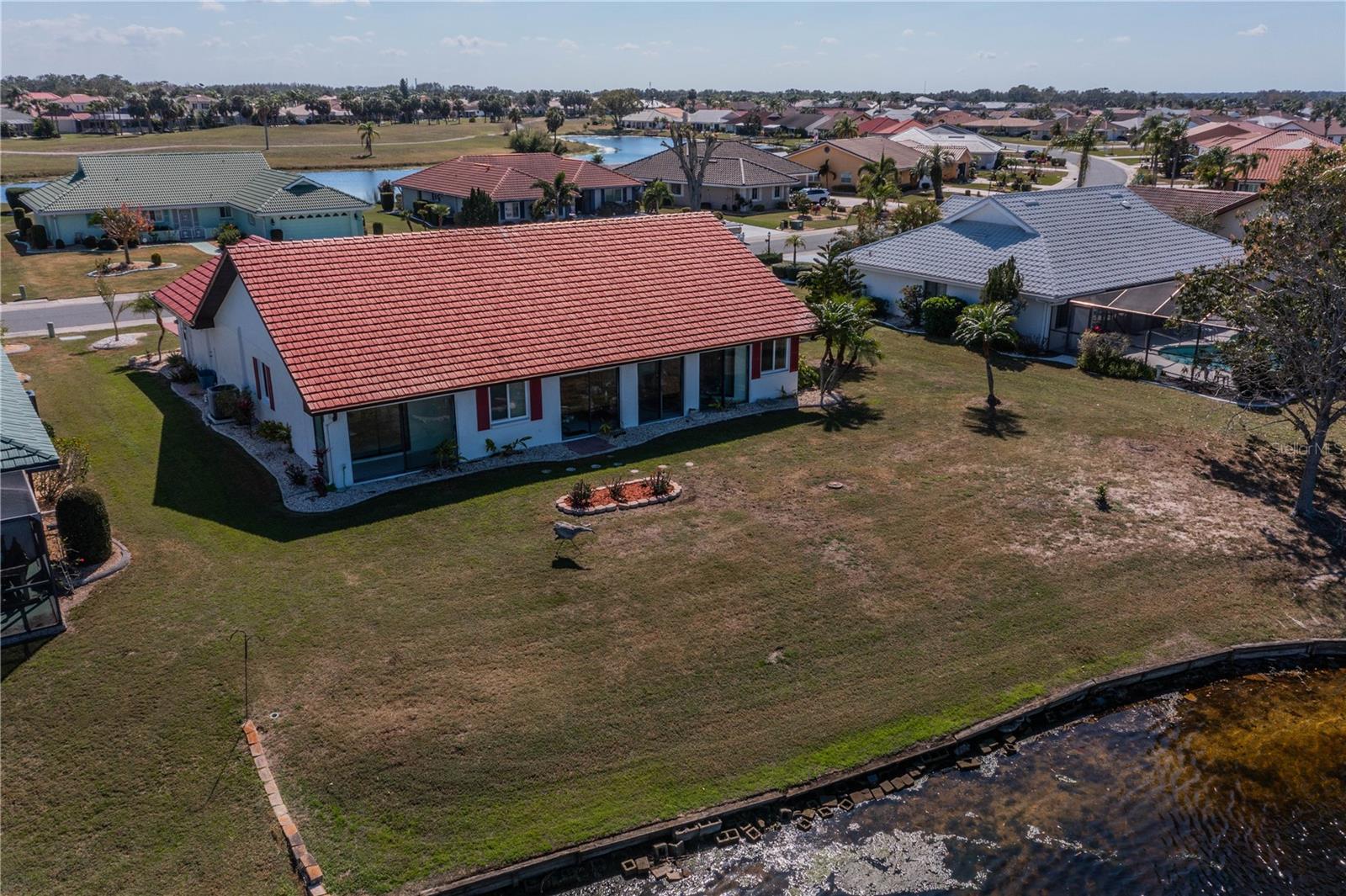 Ariel photo of property and the lake