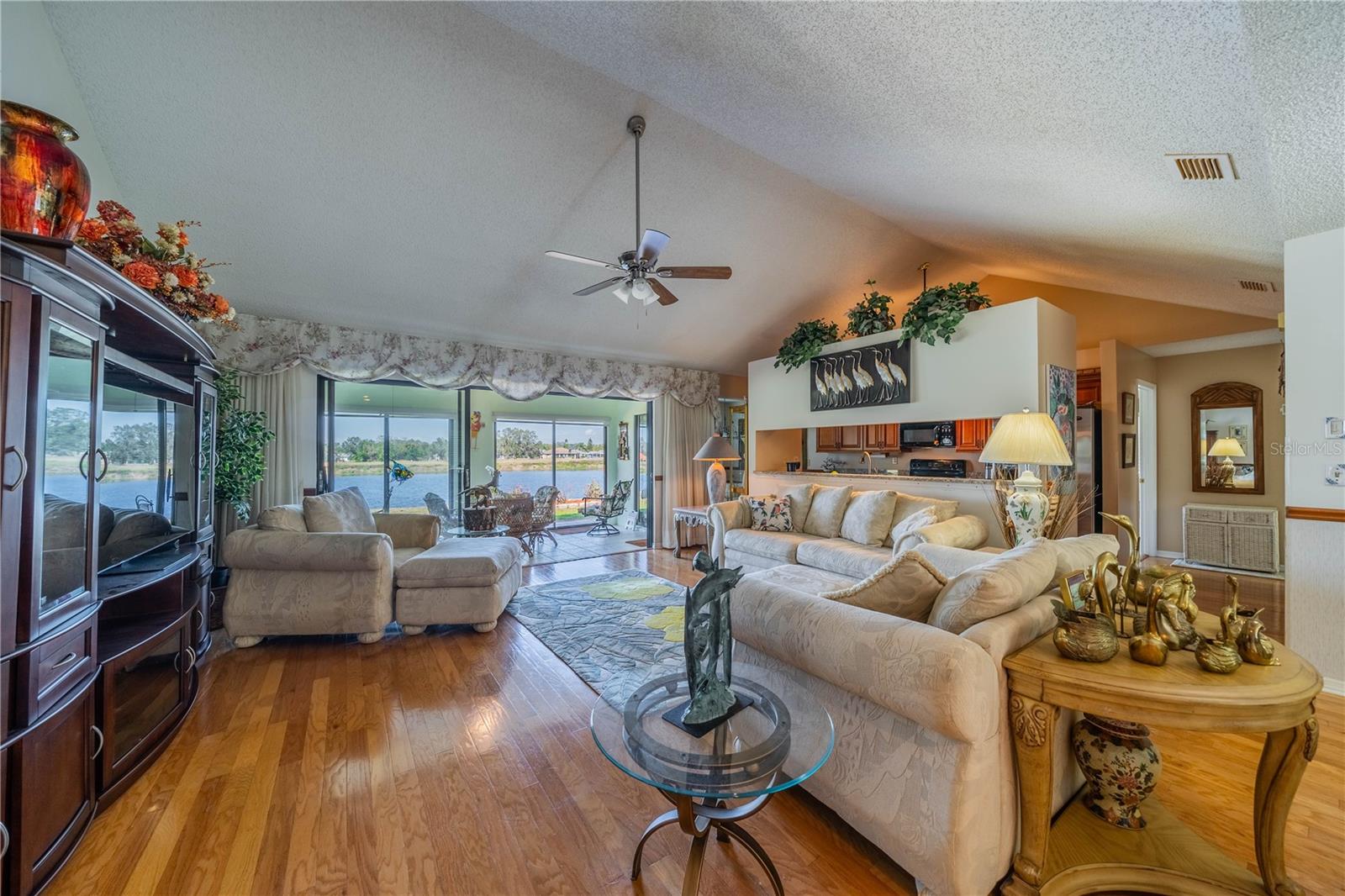Large living area with hard wood floors