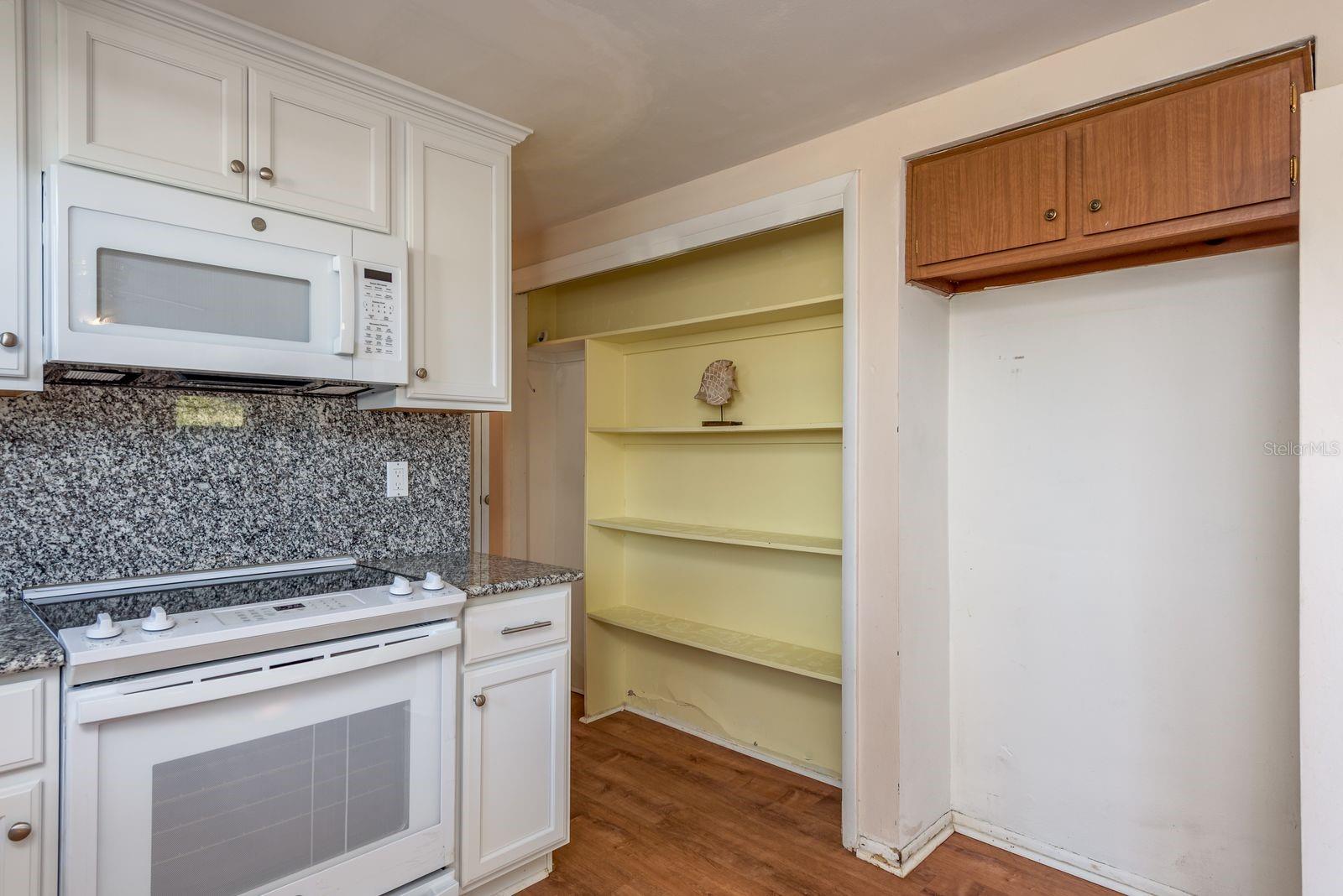 Kitchen w/ pantry and space for Fridge View