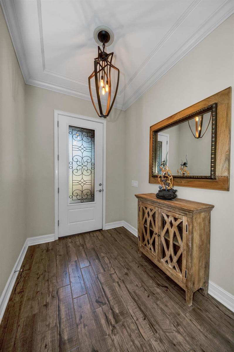 Foyer - Tile floors - Coffered 10' Ceiling