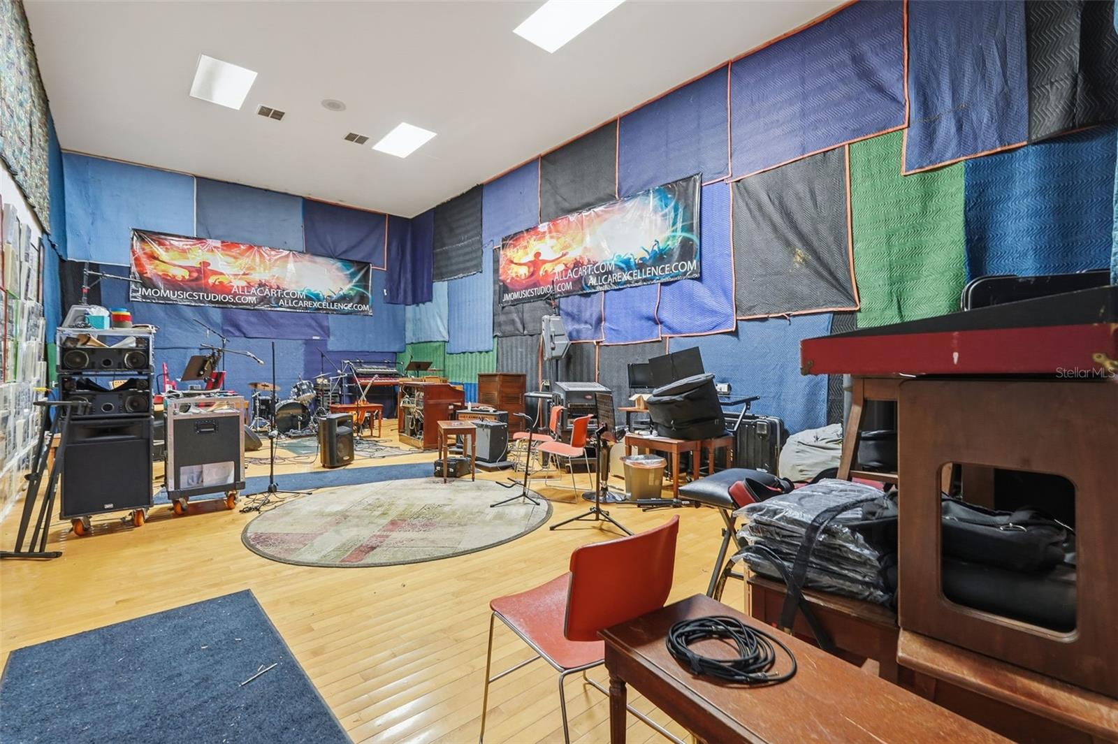 Music studio, could be converted back to a racquetball court.