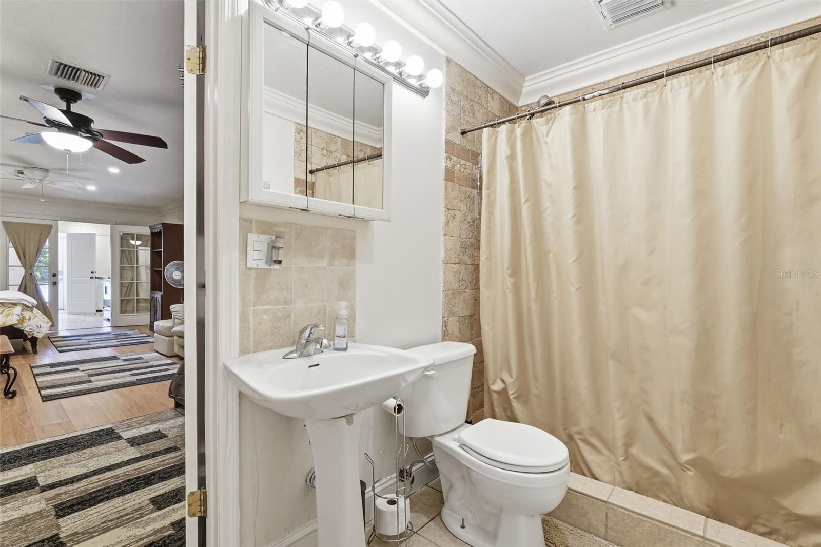 Bathroom one in apartment.