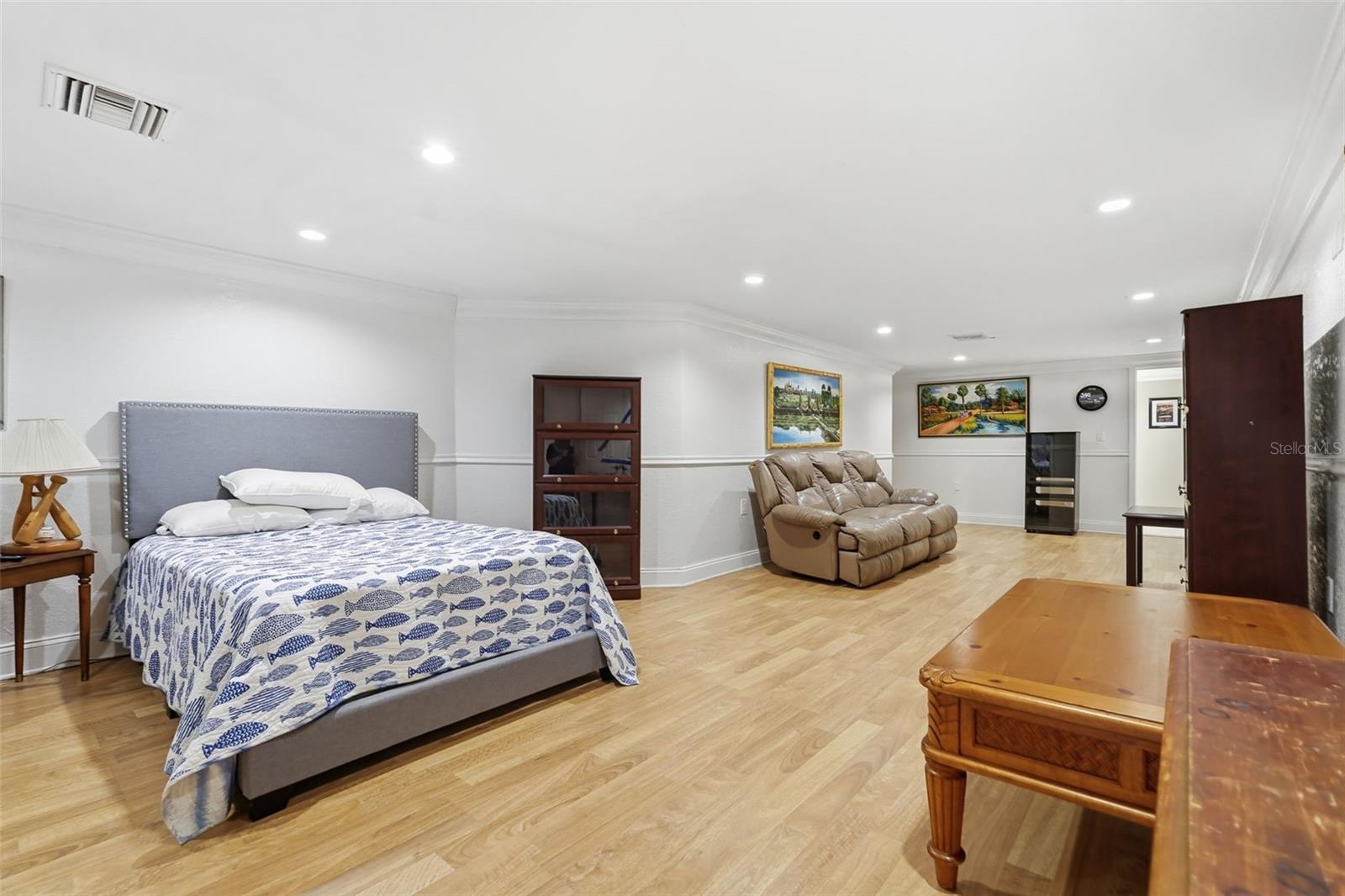 Bedroom and add'l living area in apartment.