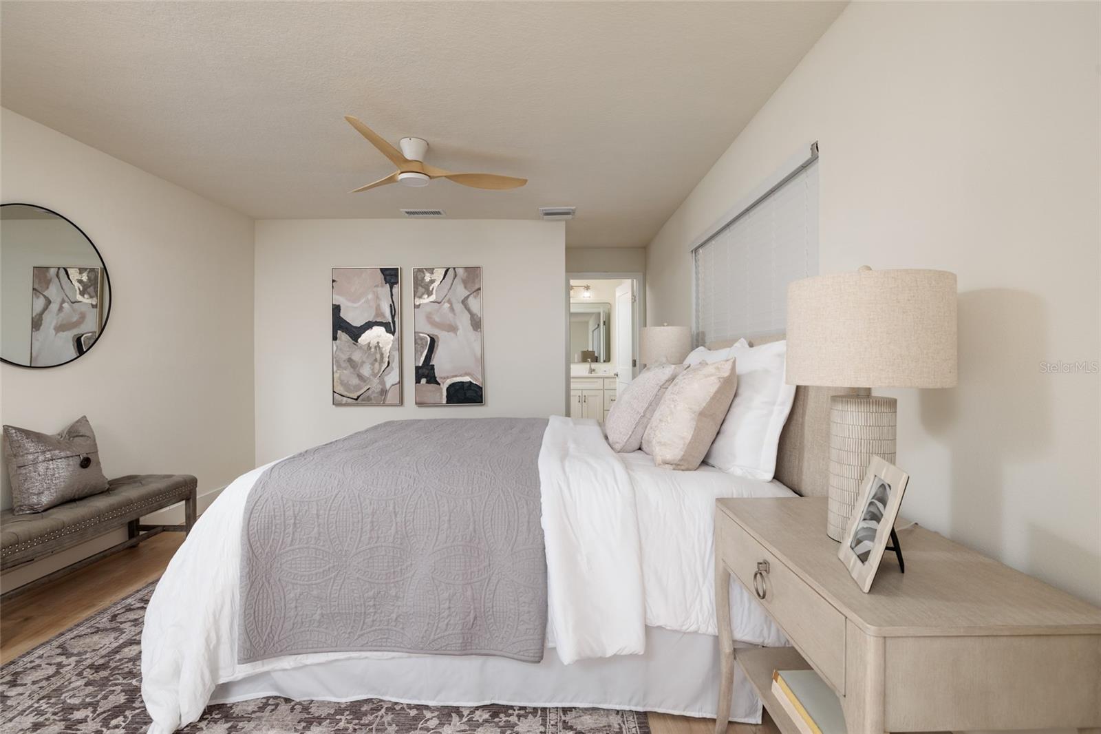 Generously sized primary bedroom retreat promises ultimate rest and relaxation