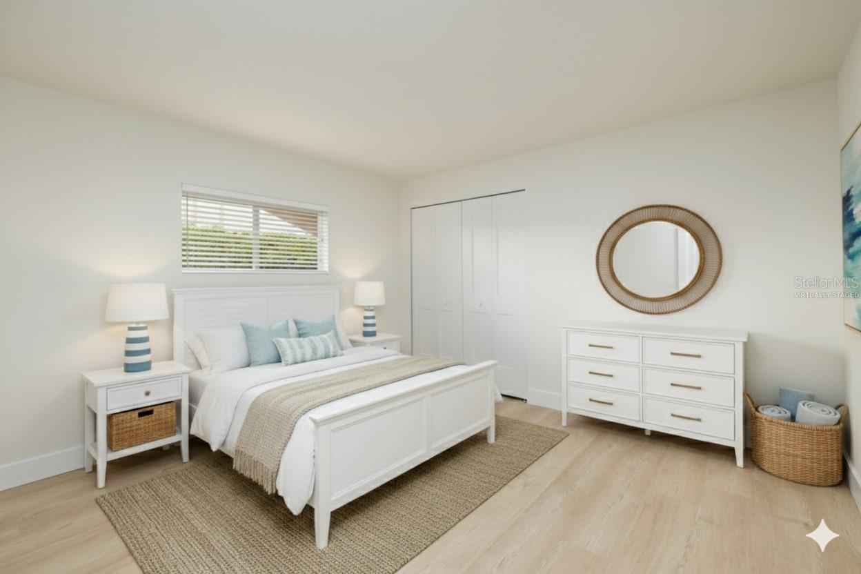 Third light-filled bedroom ideal for home office or flexible living space- virtually staged