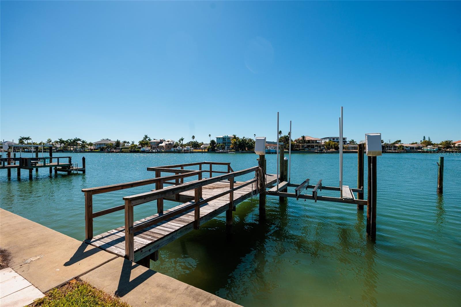 Unobstructed water views extend from your private coastal Florida dock