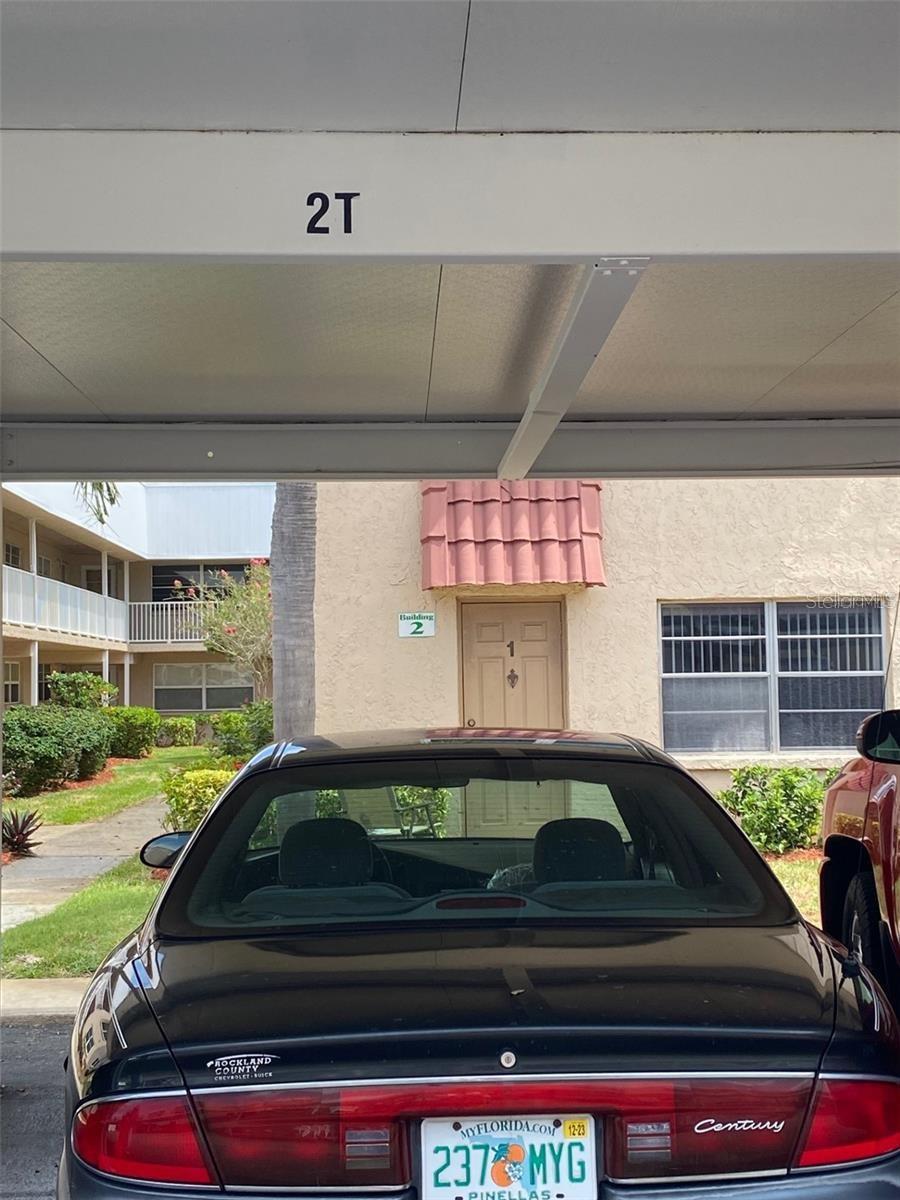 Carport Parking 2T right outside door leading into Florida Room
