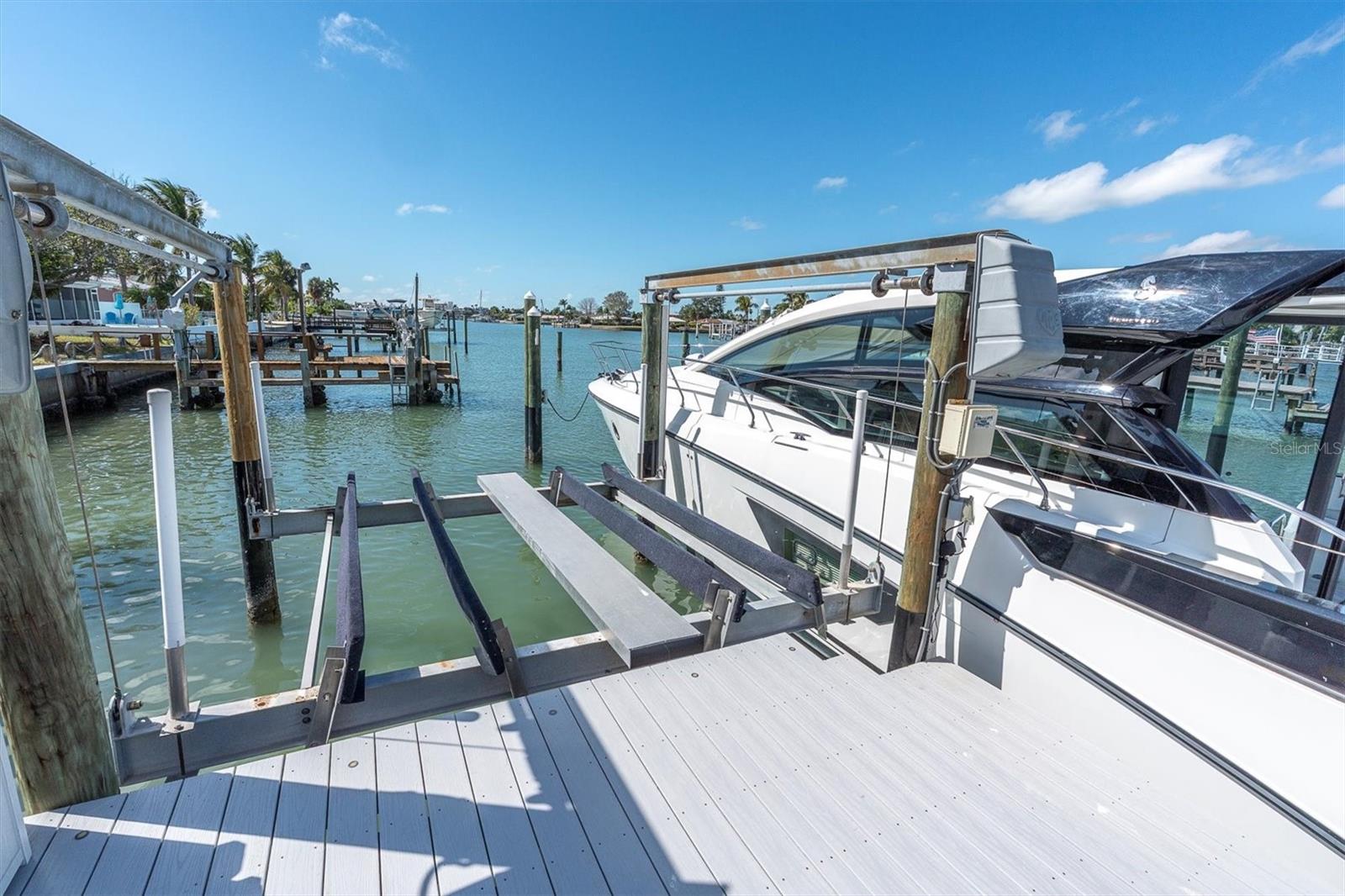 Boat lift included, making it simple to dock multiple vessels and enjoy effortless waterfront living.
