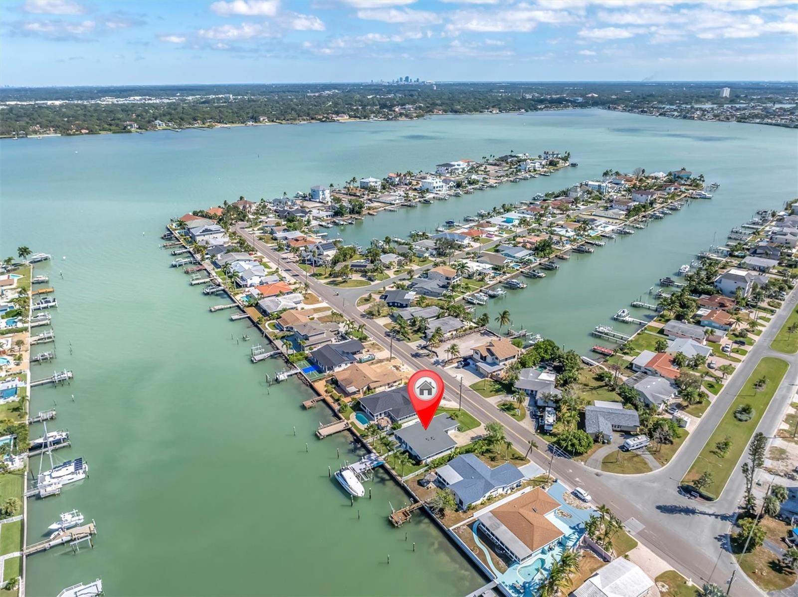 Situated on a wide, deep channel, this home offers convenient access to major airports, shopping, dining, and some of Florida’s finest beaches.