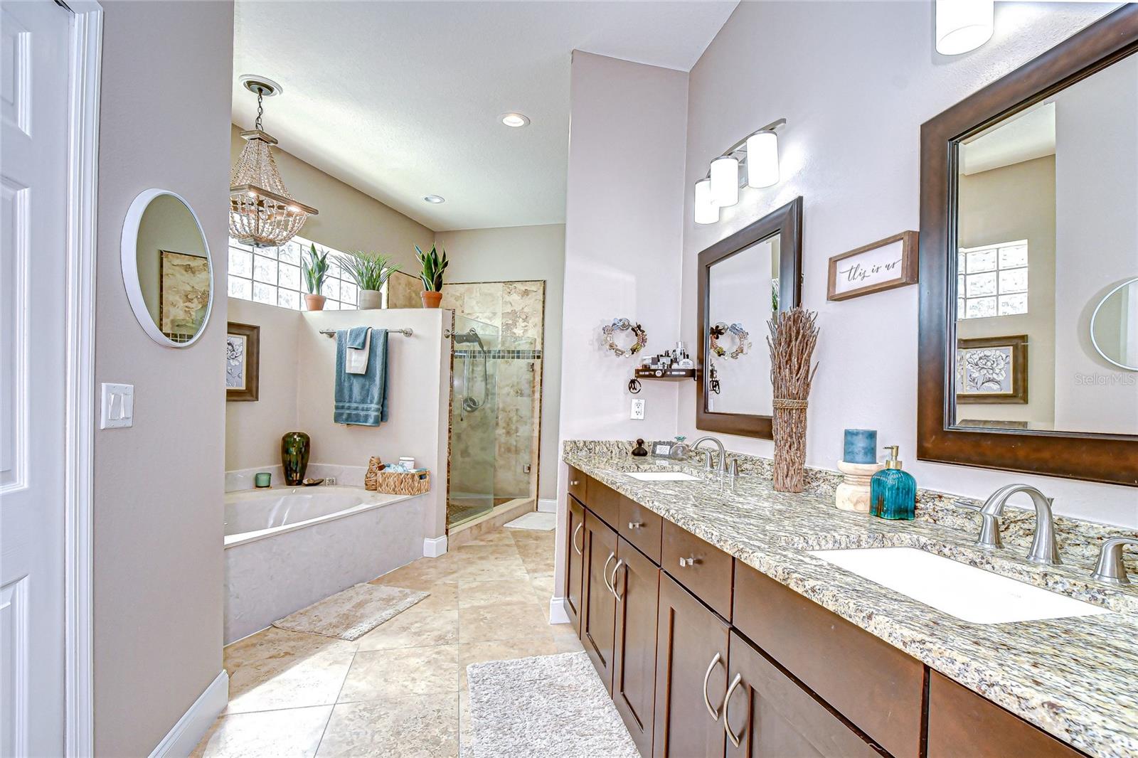 Spa-inspired bath with dual sinks and granite counters!