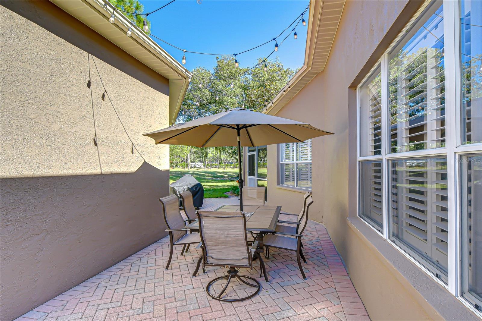 Expanded open patio with panoramic golf course views