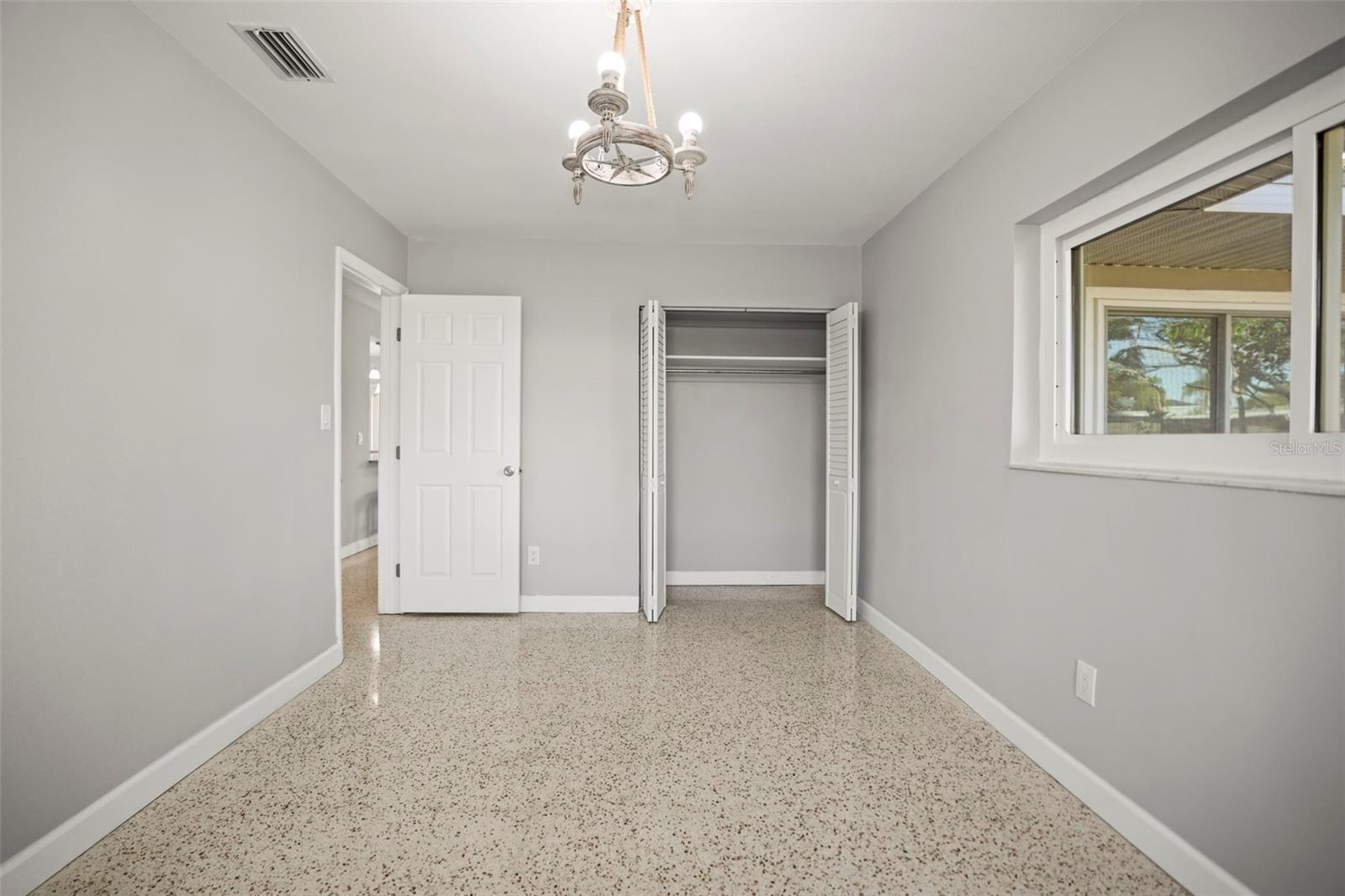 Bedroom 2 - Gleaming Terrazzo floors