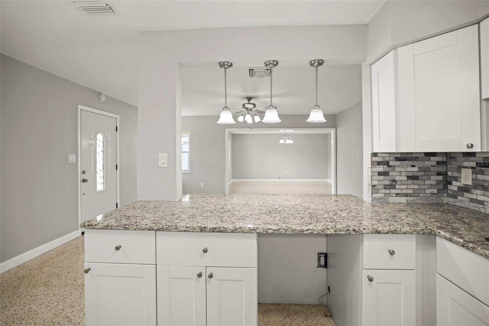 Updated Kitchen with new cabinets and granite counters. seller offering $2,500 towards appliances