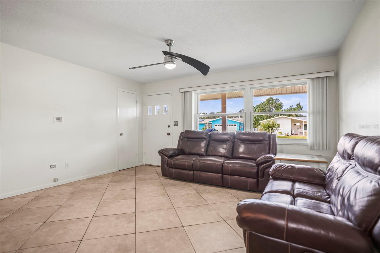 Living Room with tile flooring