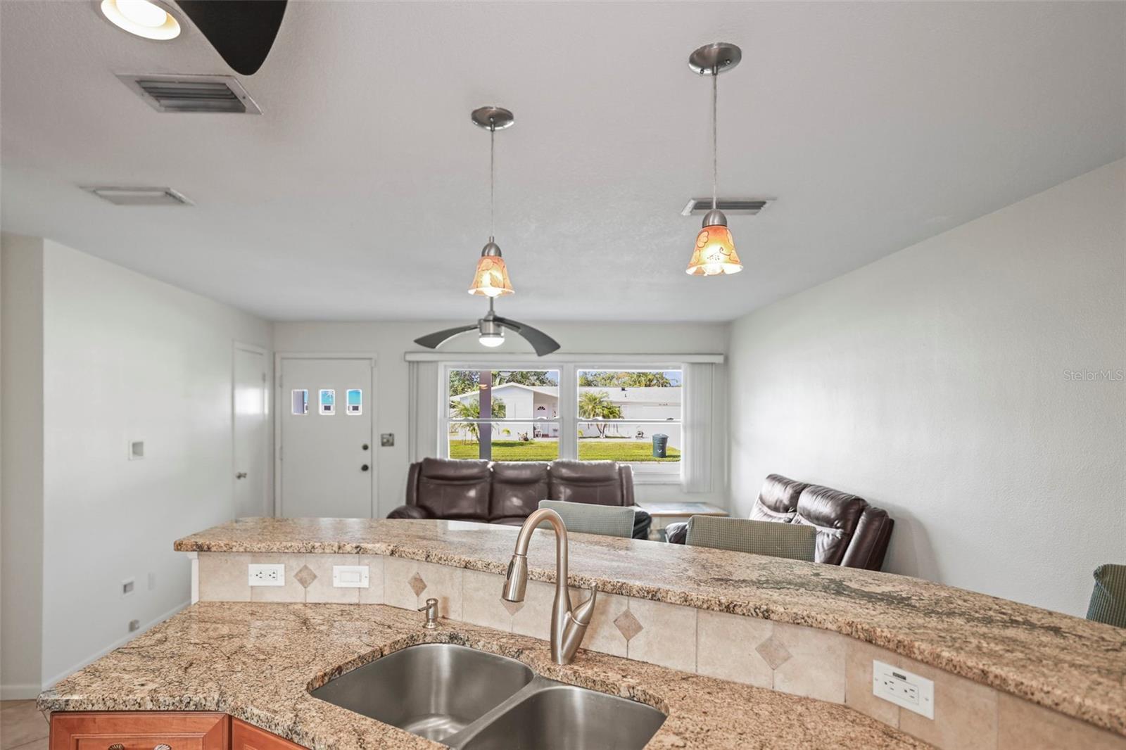 View from kitchen opens to the living room