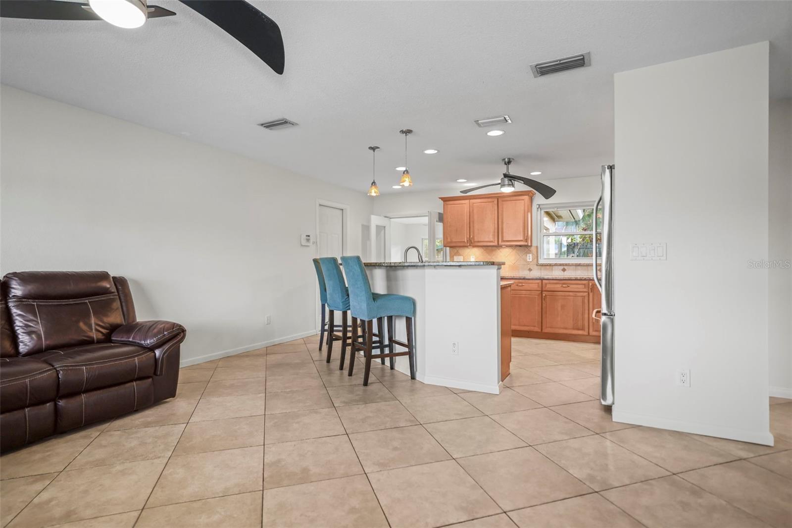 Living room/kitchen combo all tile flooring