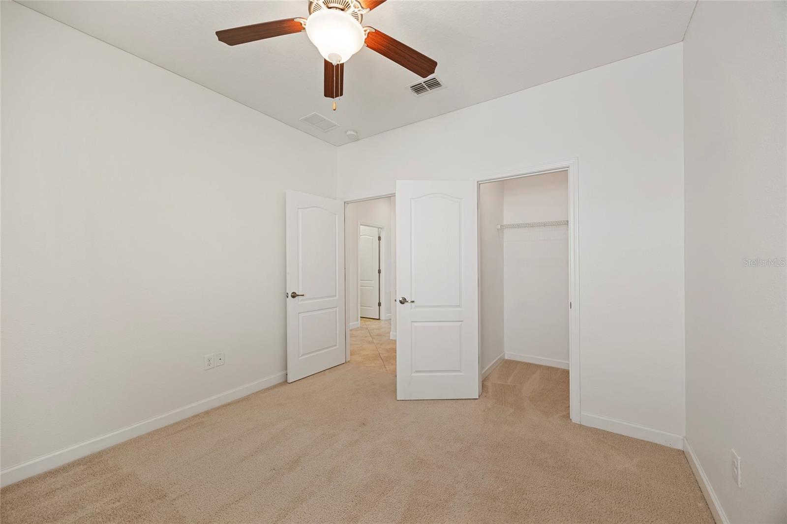 Bedroom 2 with walk-in closet