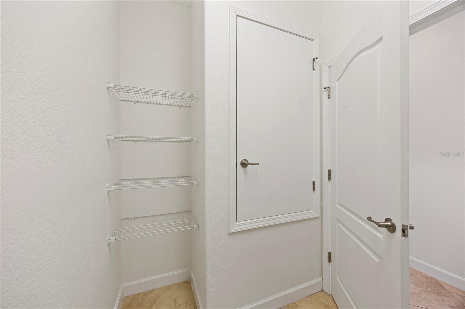 Convenient additional shelving in Laundry Room