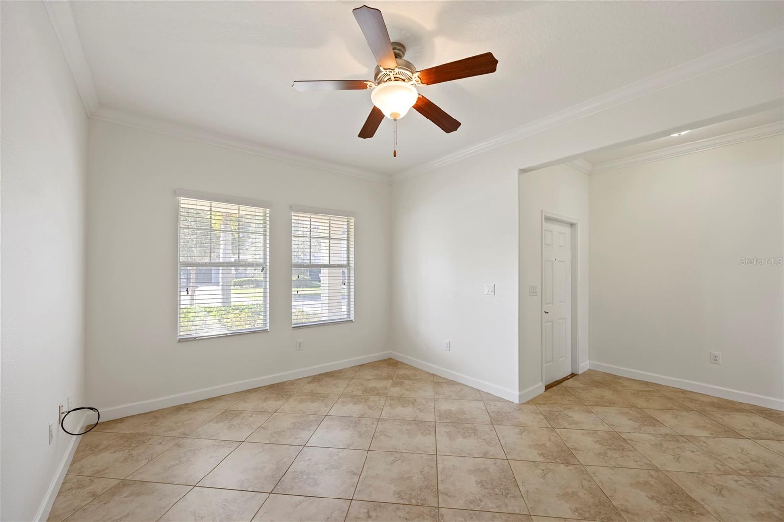 Windows overlooking front porch with abundant natural lighting