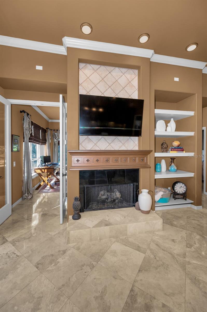 Family room w/gas fireplace and built-in shelves