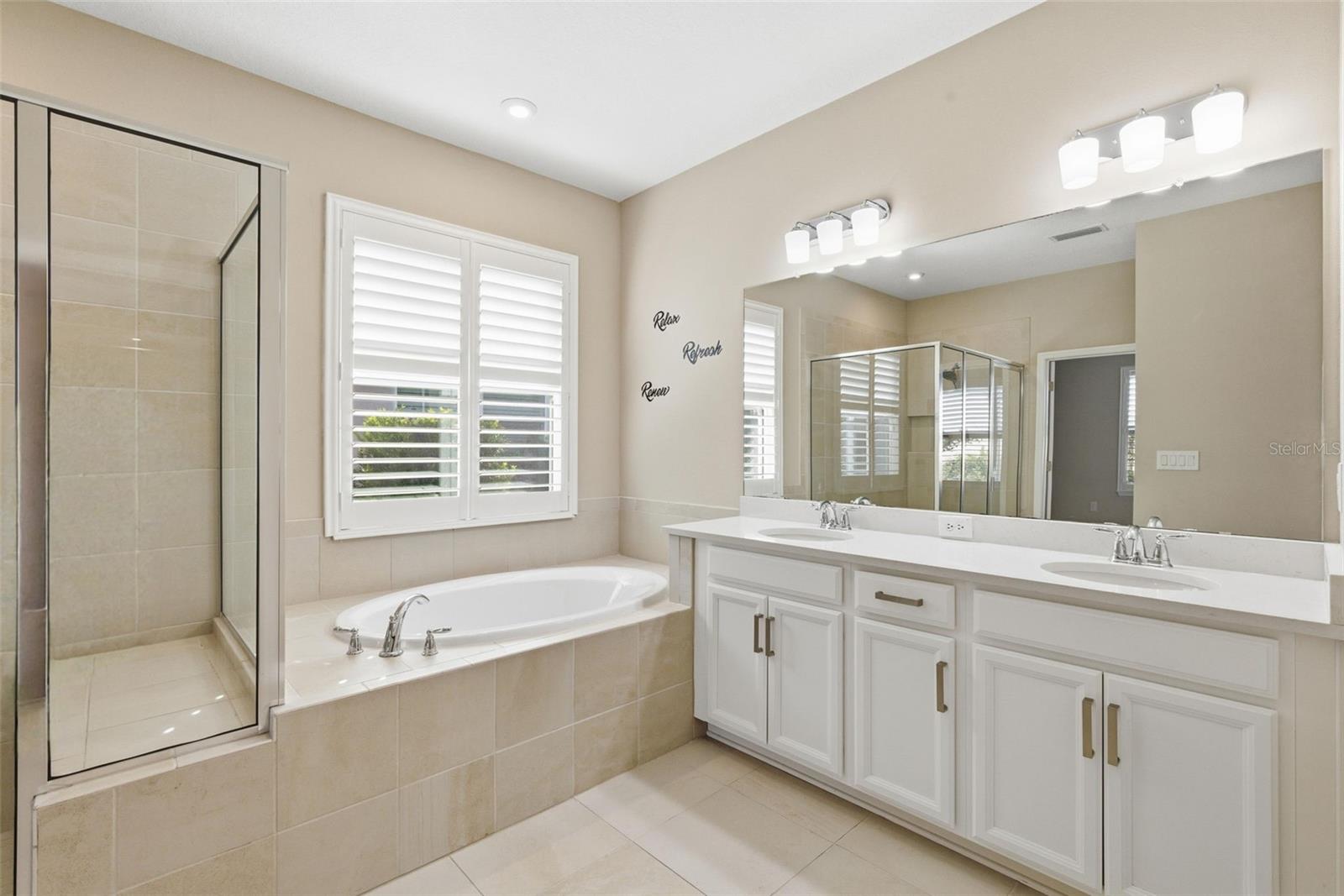 Primary En-Suite: Soaking Tub, Quartz Counter Top