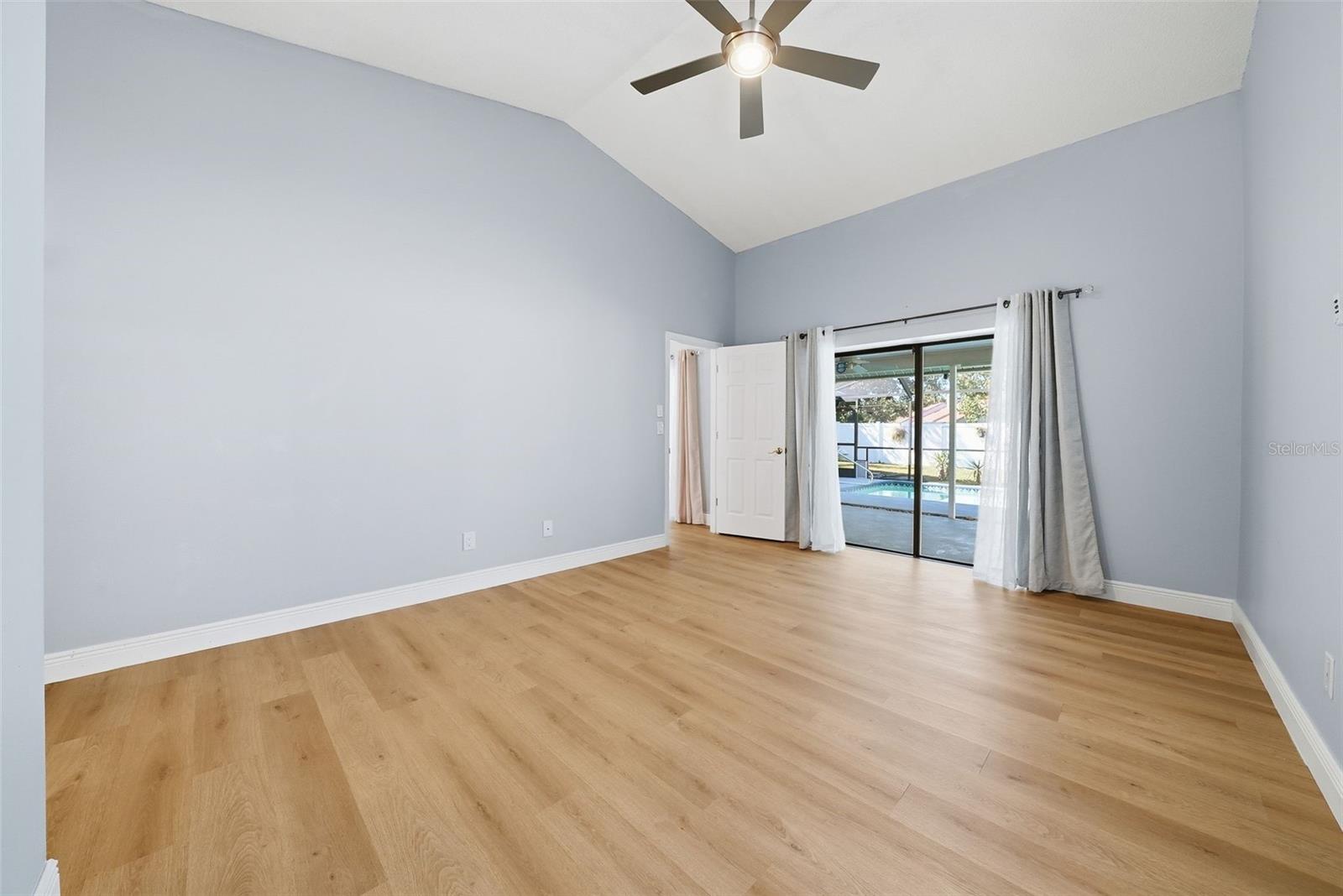 Primary Bedroom with Pool View