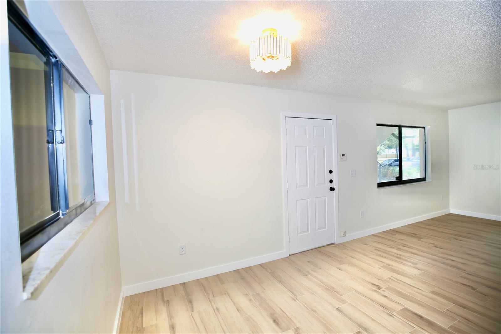 Kitchen looking into Dining Room and Great Room