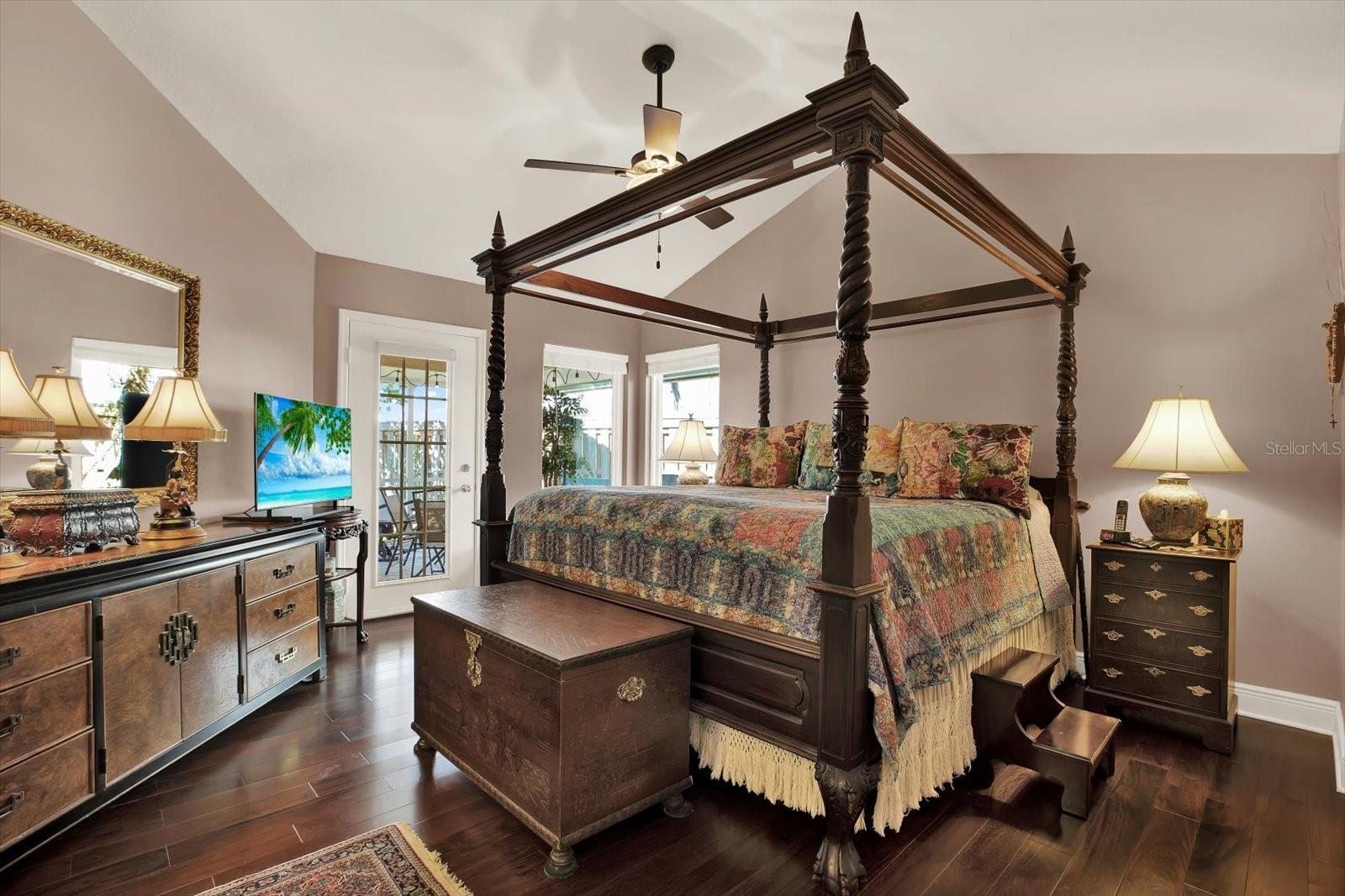 Master bedroom w plenty of light and  Lanai access