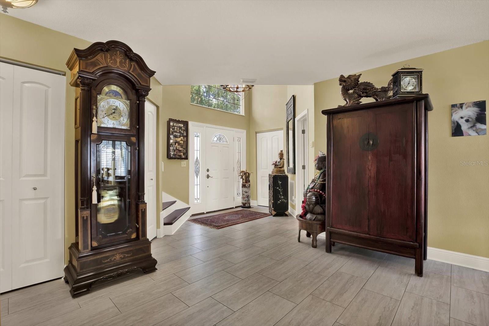 Expansive Entrance w Soaring Ceiling