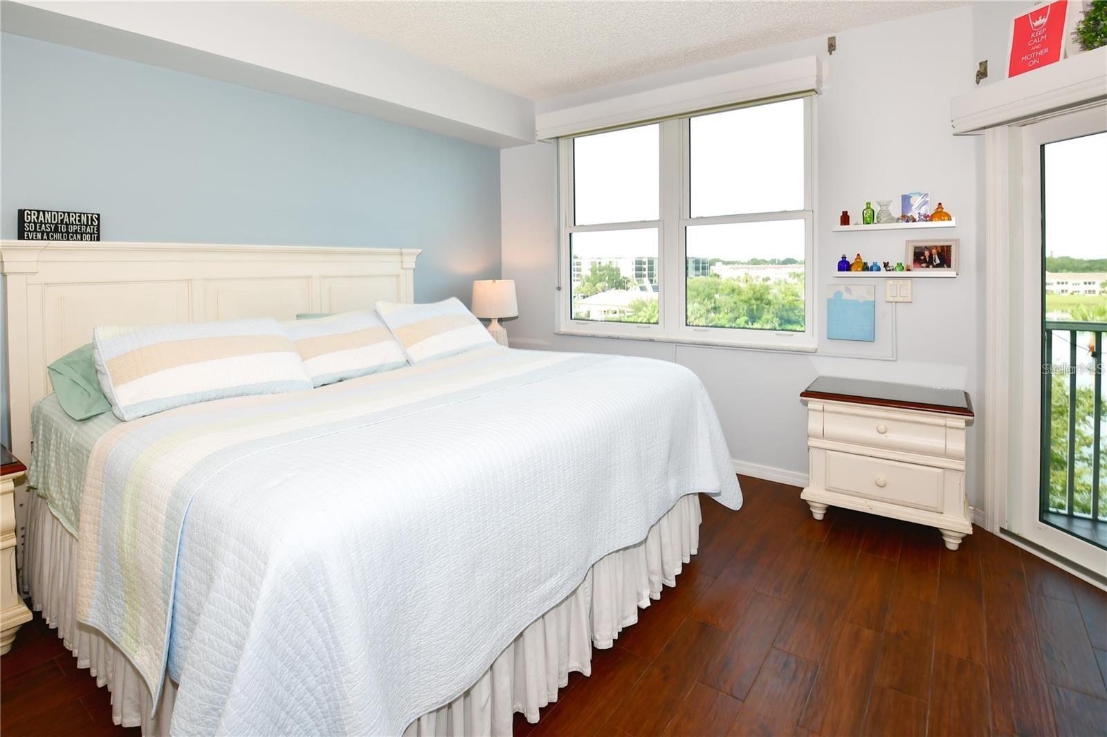 The large primary bedroom also has wonderful water views.