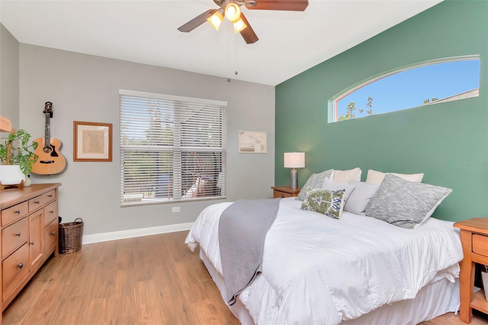 Primary Bedroom windows overlooking pool