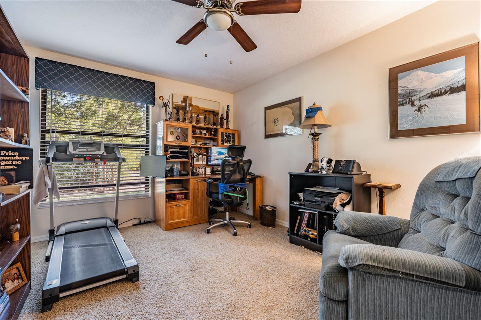 Guest Bedroom 2, Blinds and a ceiling fan with a light fixture