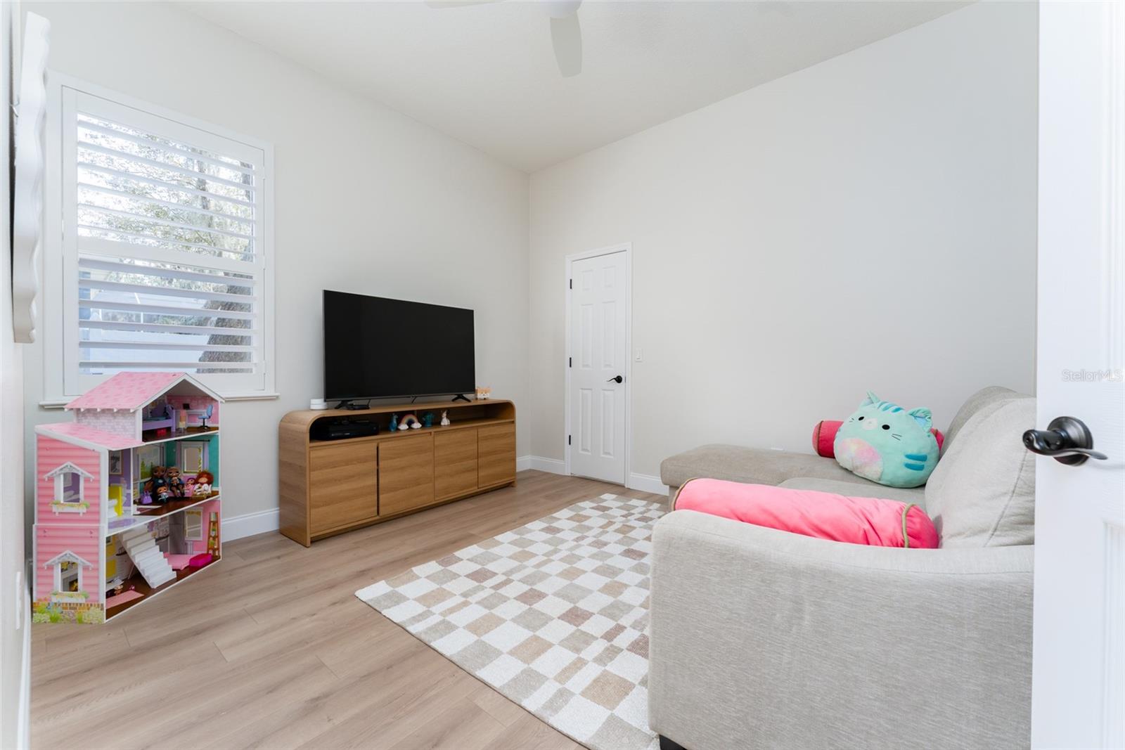Bedroom 3 with walk in California Custom Closet, and New Flooring