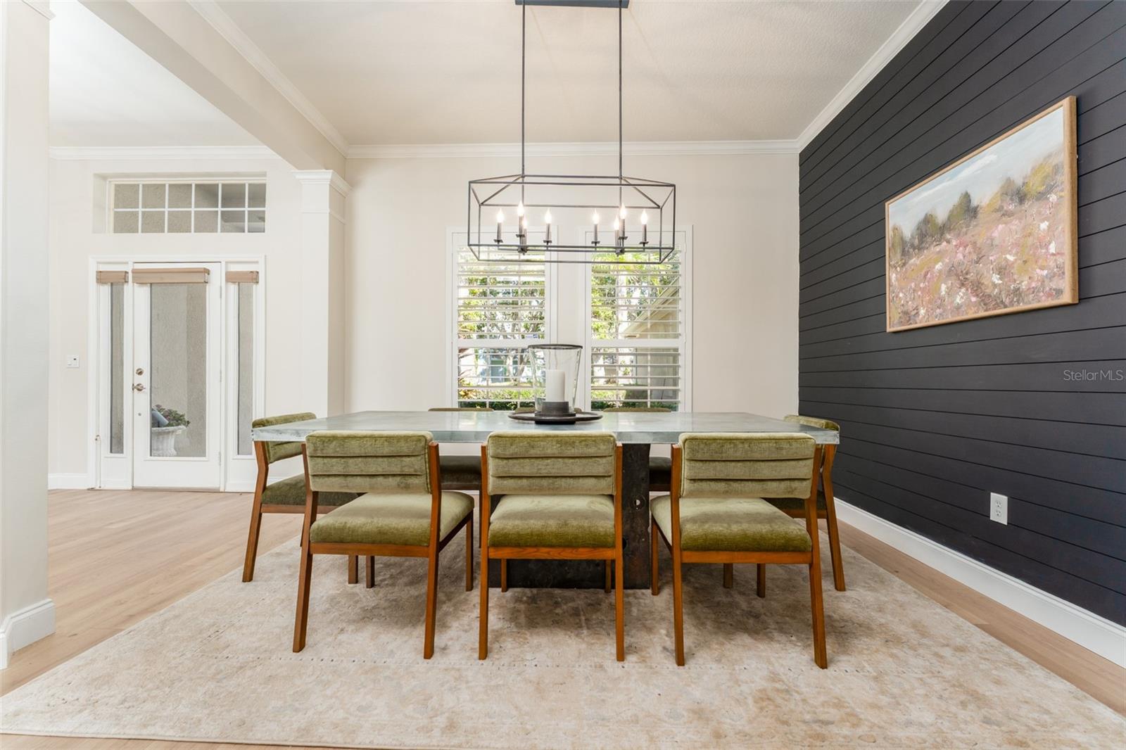 Formal Dining Space with Custom Decorative Feature Wall