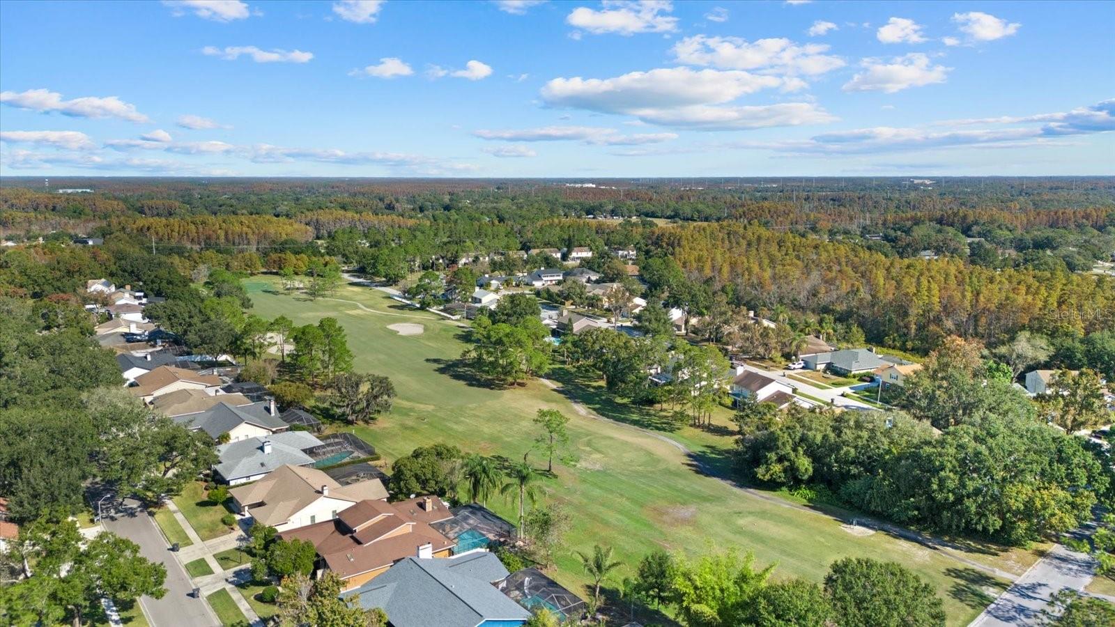 gold course fairway behind home