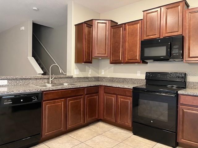 Black Appliances with good Prep Space.