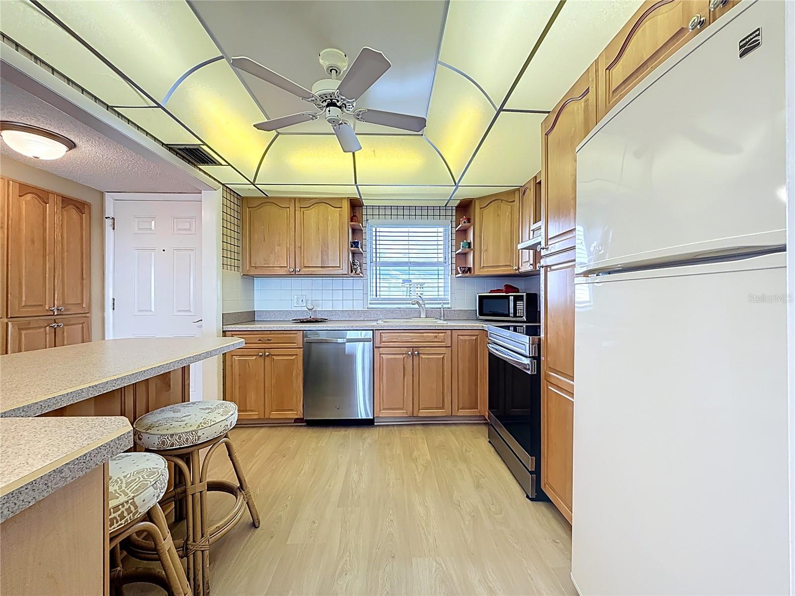 View of the nice sized kitchen that offers lots of counter space for cooking and entertaining.