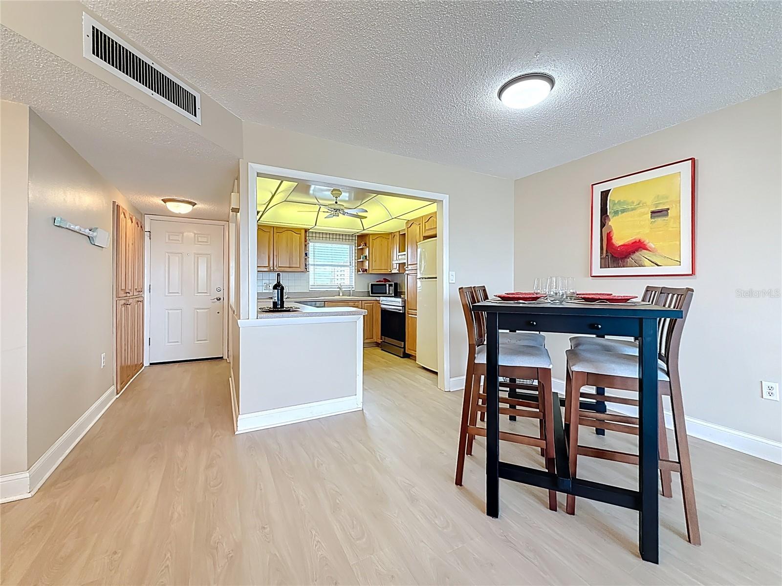 This shows how this owner has set up her dining area,  Keep in mind that there is lots of room for a larger sized table.