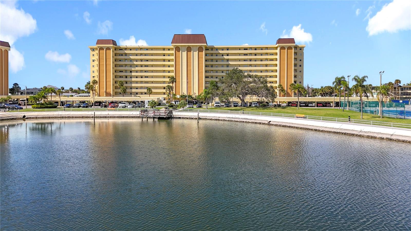 The Columbia building overlooks a lagoon with a fishing dock located right across from the Columbia building