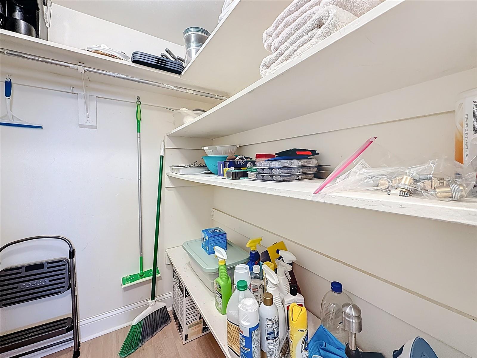 Utility closet with lots of room for storage.