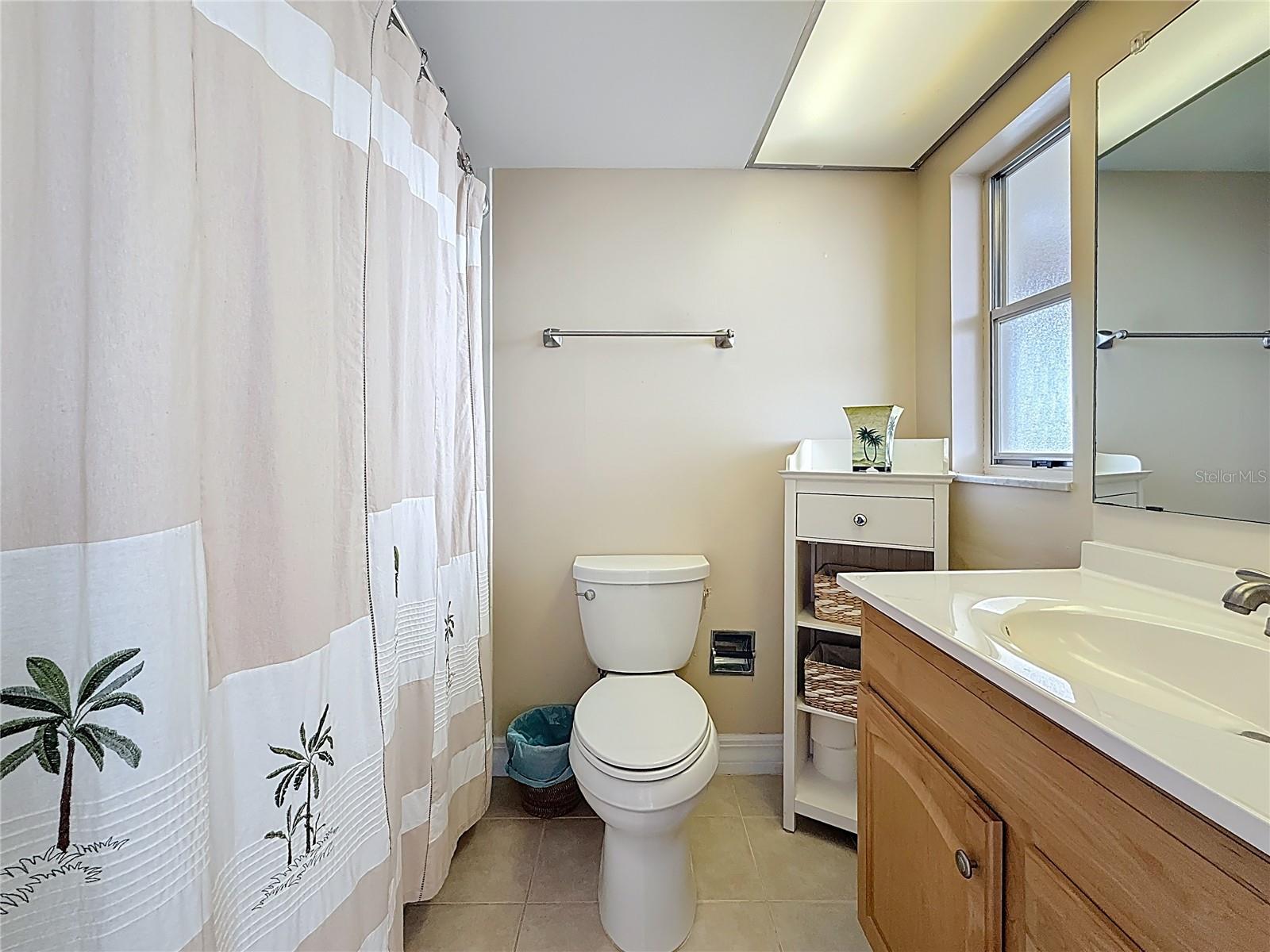 The total view of the primary bathroom, very convenient to have as part of your primary bedroom.