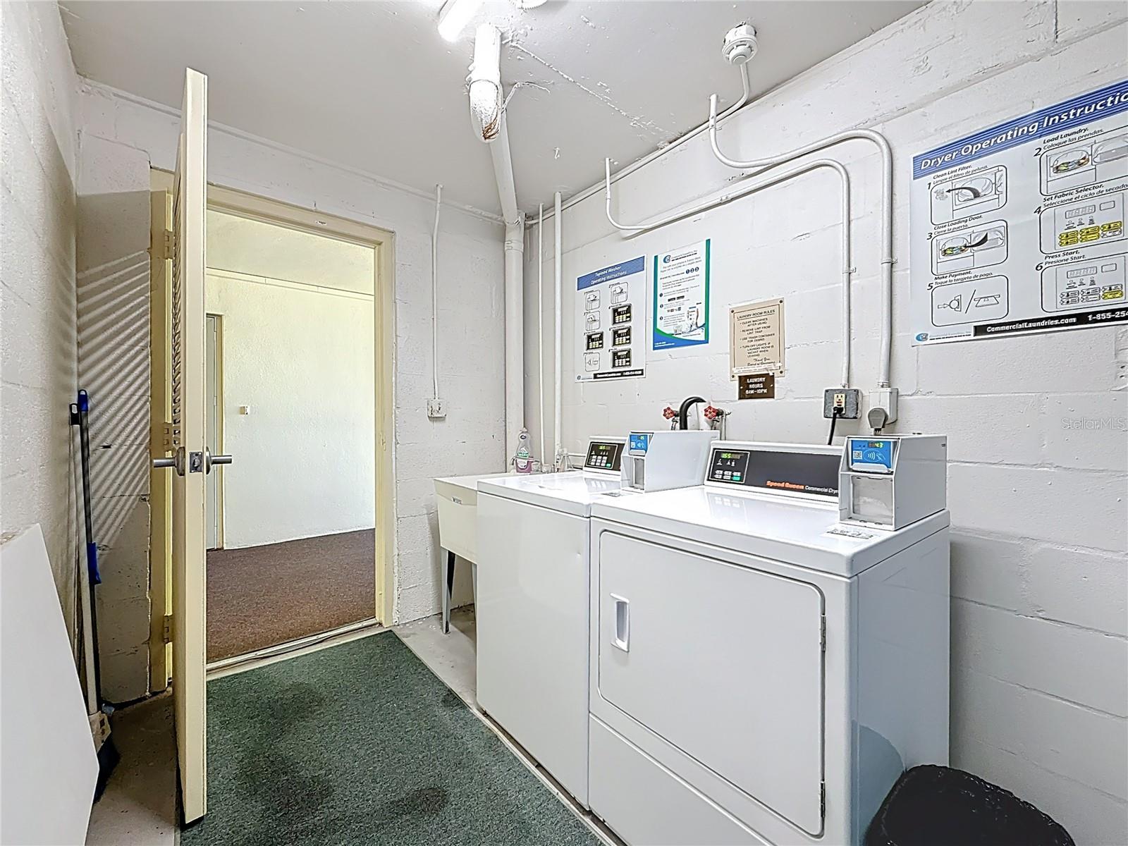 This is the laundry area, located right on the same floor as your condo, very convenient.  Each floor has its own laundry area.  It is nice that you also have a sink.
