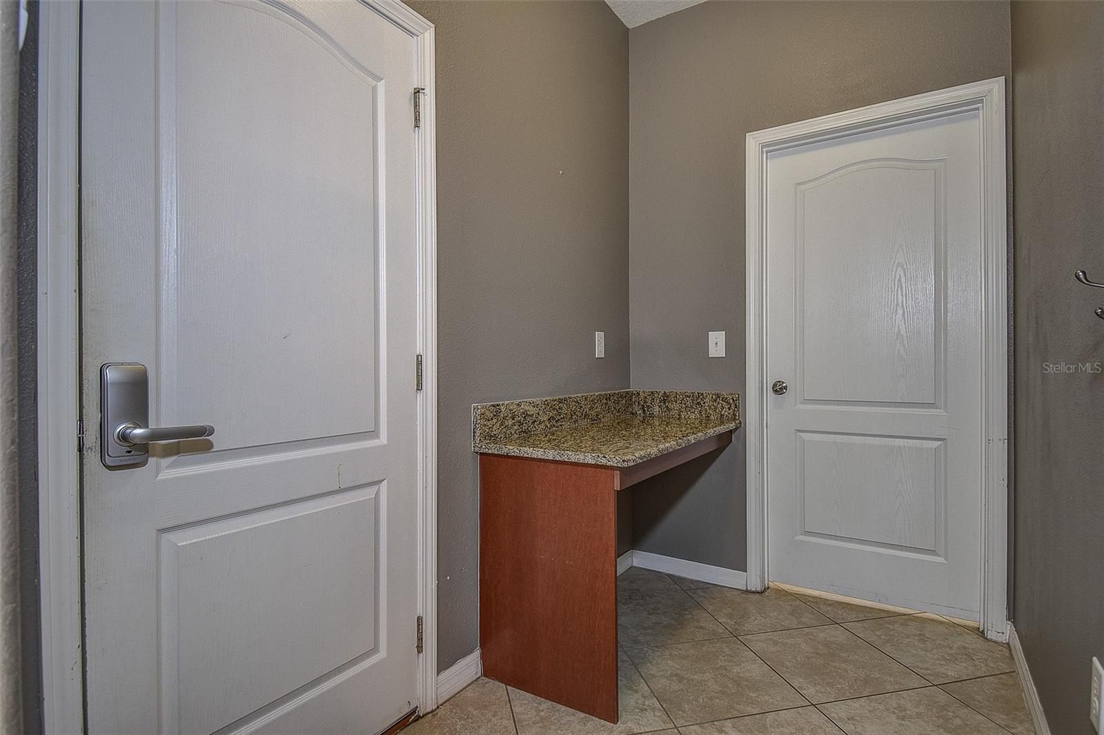 1st Floor office area by garage entrance