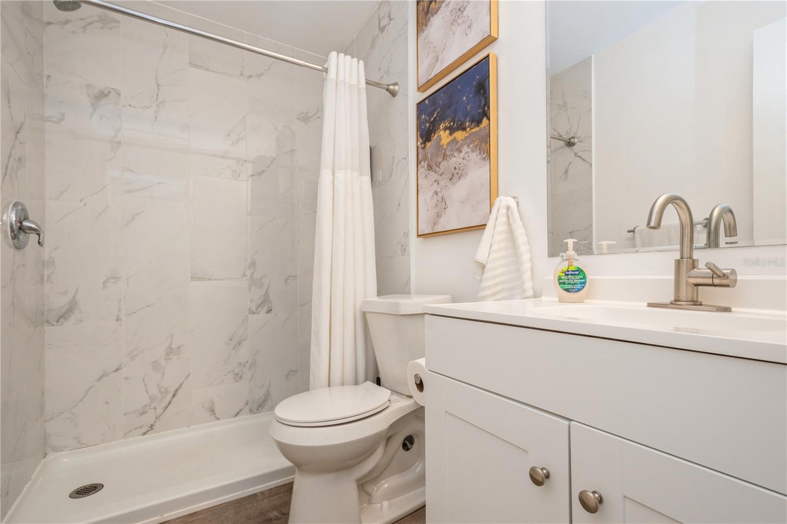 Secondary bathroom with beautiful modern finishes.