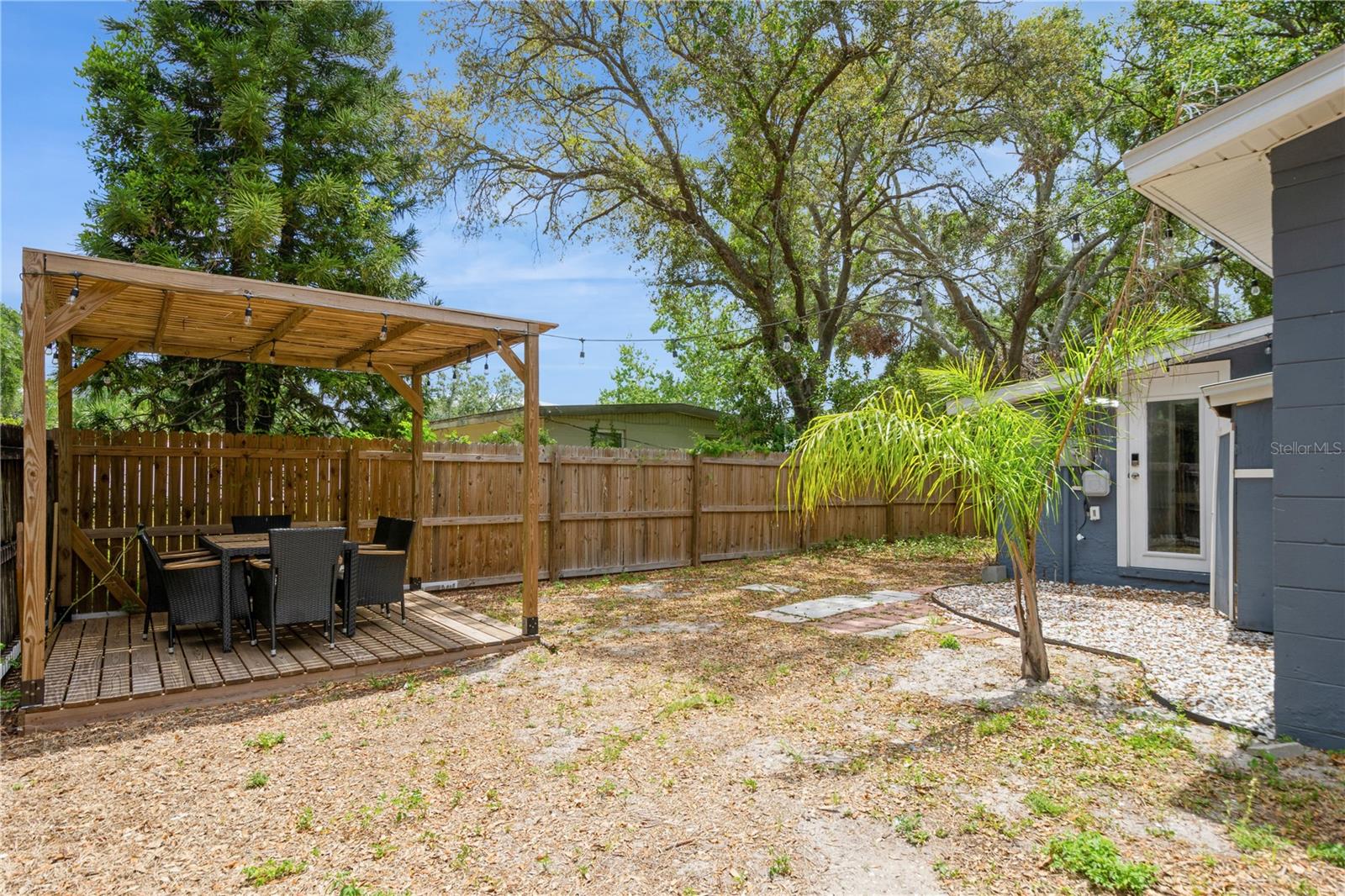 Backyard fit for entertaining! 6-seat patio table and Gazebo perfect for outdoor Florida fun!