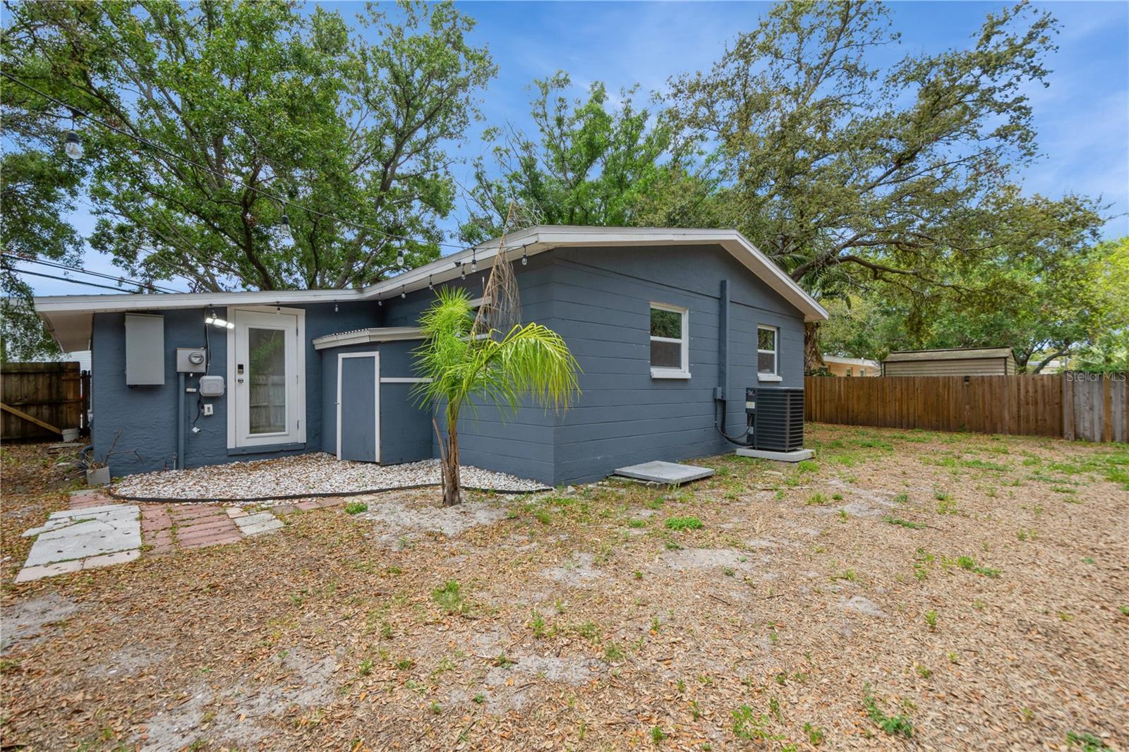 Spacious, fenced backyard.