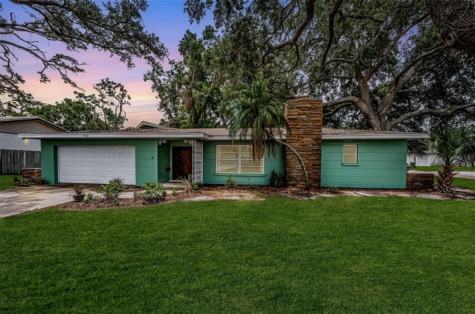 Mid Century terrazzo dream home on huge corner lot.