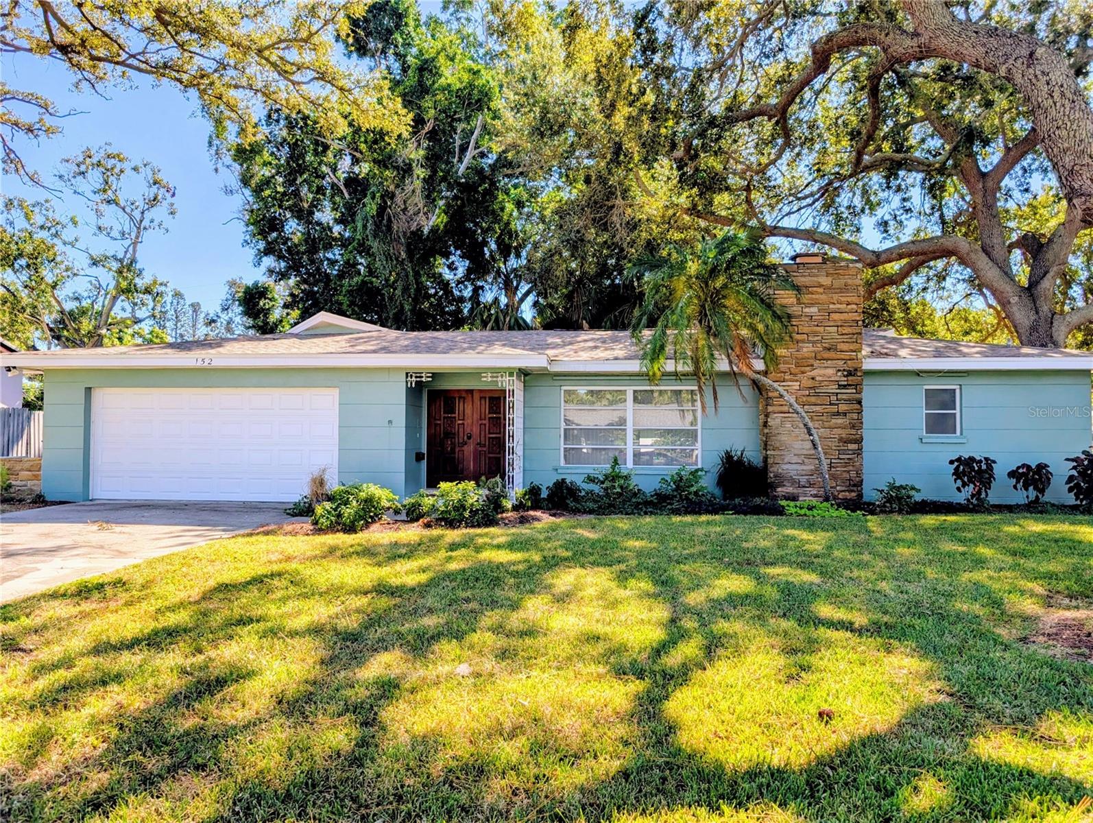 Mid Century terrazzo dream home on huge corner lot.